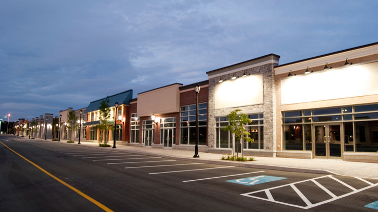 Strip mall with clean parking lot Strip mall with clean parking lot